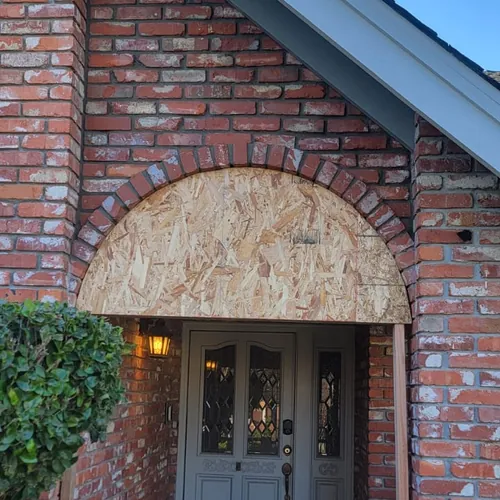 Brick arched porch and steps on a Sacramento family home