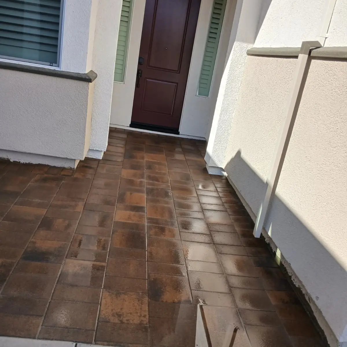 Tiled entry walkway leading to a front door in Sacramento