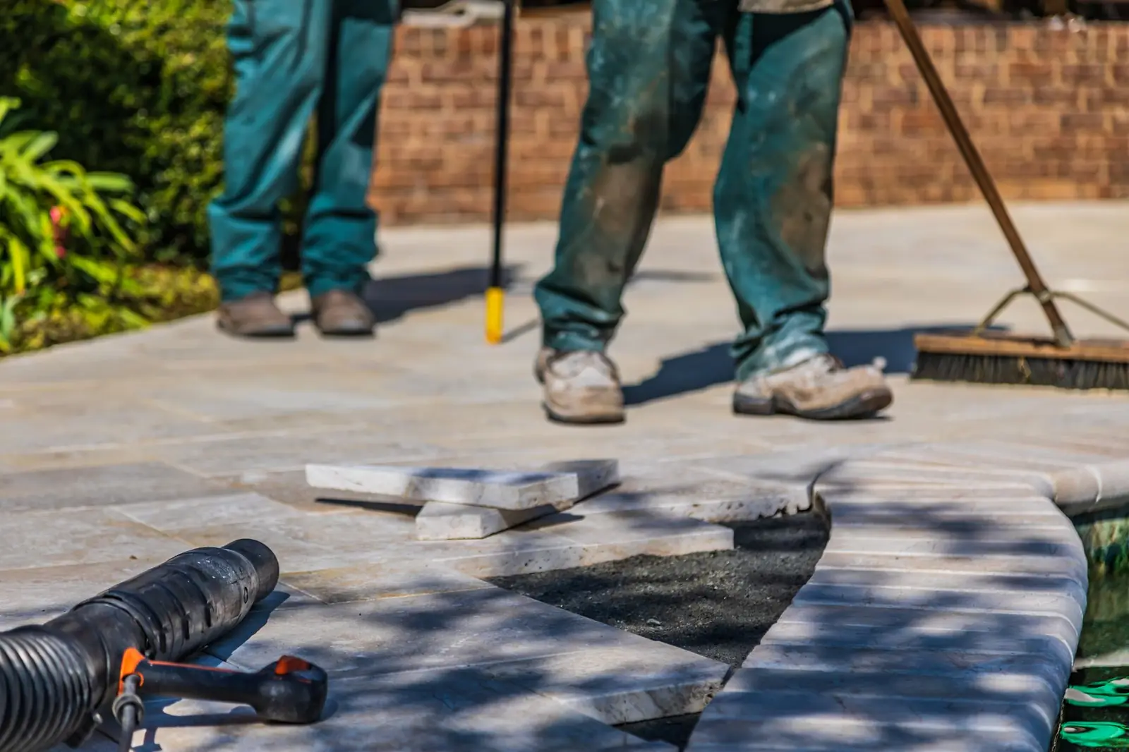 A stonemason at work on a wall